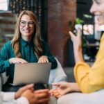 Hotel manager reviewing corporate travel data via GDS platform